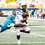 Mountaineer football holds off Coastal Carolina